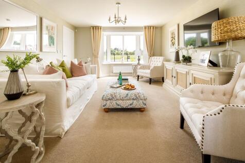 A large living room with lots of space for those family movie nights