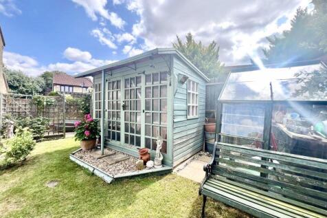 Summerhouse And Greenhouse