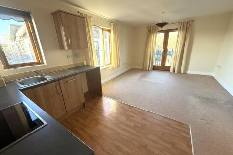 Living Room With Fitted Kitchen Area