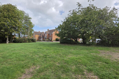 The Green At The Front Of The Property