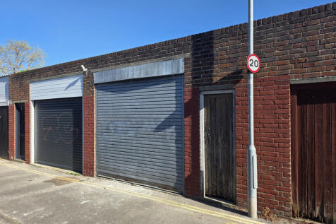 Garage with larger storage area and roller shutte