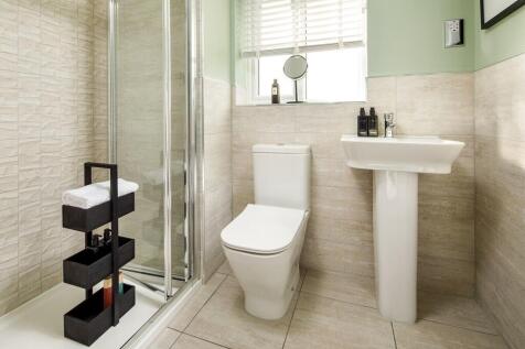 The main bedroom benefits from an en suite shower room
