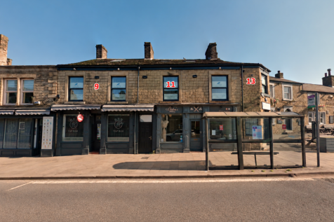 Red-numbered historic building facade.png