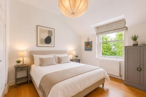 bedroom two dressed as a double overlooking commun