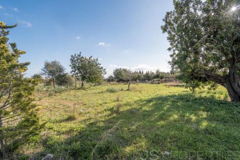 Land with license to build