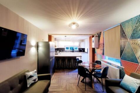 Stylish open-plan living with vibrant decor...
