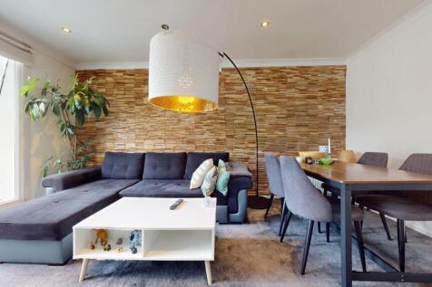 Bright, modern open-plan living and dining area...