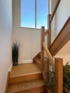 Oak/glass staircase with picture window