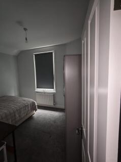 Sleek bedroom with modern decor and ample space...
