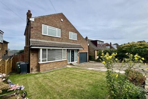 EXTERNAL FRONT, GARAGE AND DRIVEWAY