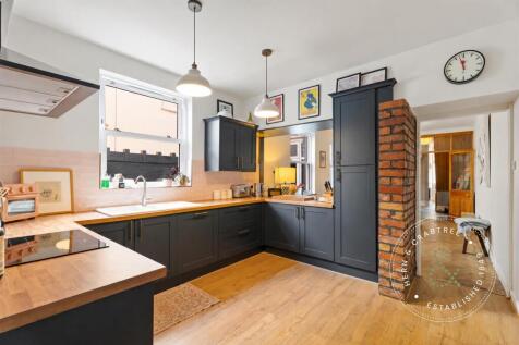 Finished Charcoal Kitchen and Warm Hallway.jpg