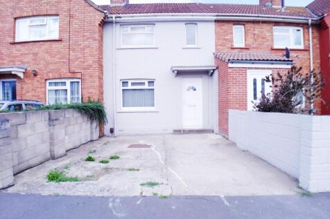 Terraced house exterior with private paved driv...