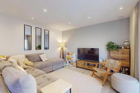 Bright and inviting contemporary living room wi...