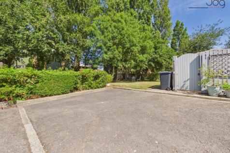 Parking and Communal Garden by the back gate of the property