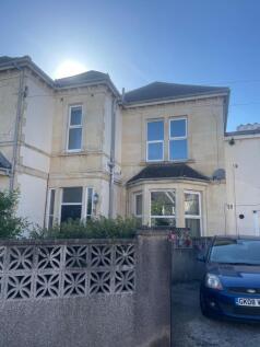 Charming period home with bright bay windows...