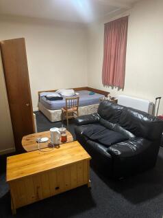 Well-appointed studio-style living area with a ...