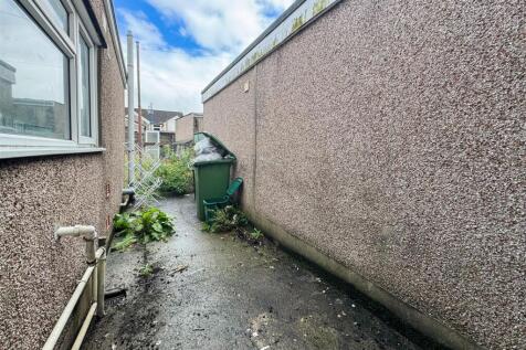 Private outdoor side access and storage space...