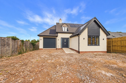 Uncluttered property exterior with bare ground.png