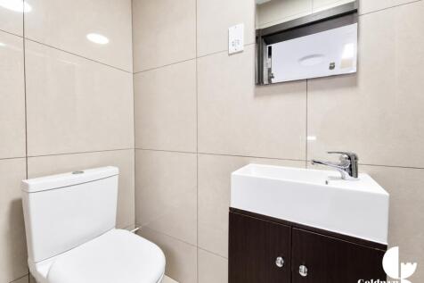 Modern Beige Tiled Bathroom