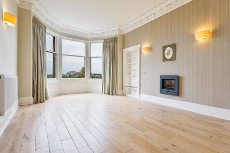 Lounge view with windows overlooking the Meadows with Castle views