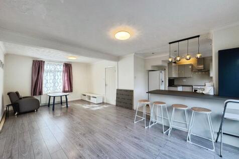 Reception/kitchen/dining area