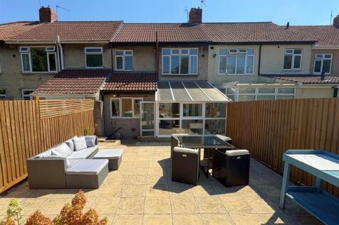Rear view of property and patio (1).jpg