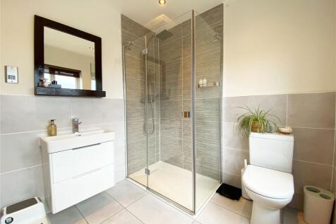 BEDROOM ONE EN-SUITE SHOWER ROOM