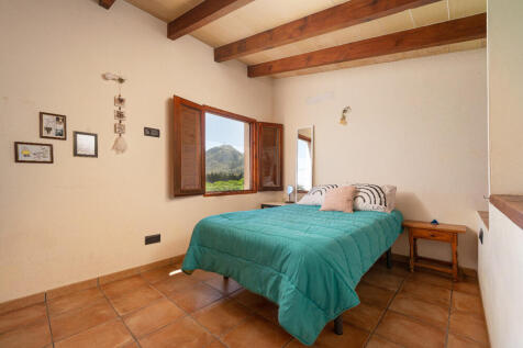 Charming Bedroom with Mountain Views