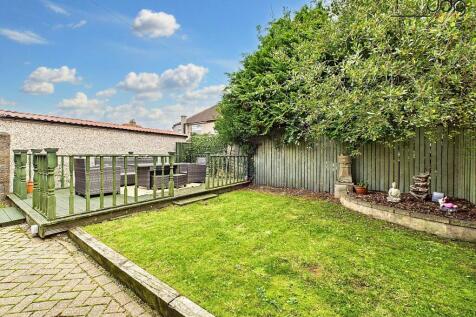 Spacious Garden with a mixture of lawn, decking and brick