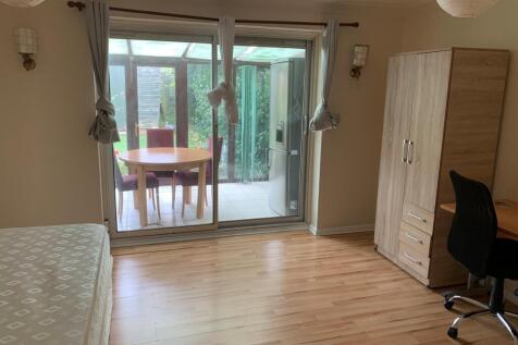 A spacious and bright large double bedroom with...