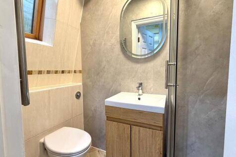Well-presented modern bathroom with a compact v...