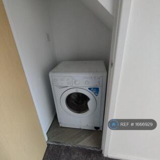 Laundry Cup'd Under Staircase
