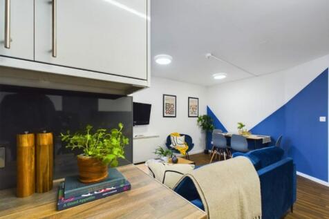 A stylish and spacious modern living room, perf...