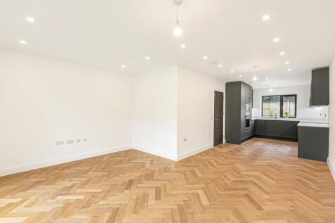 property in Grand Drive, 
Raynes Park, SW20