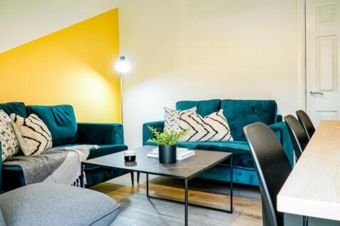 A stylish and inviting large modern living room...