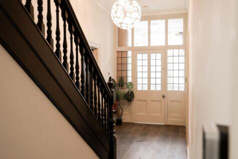 Bright grand entrance with period staircase...