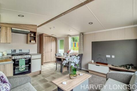 Open plan lounge and dining area in the Swift Roya