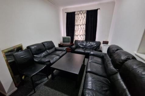 Sociable seating area with leather sofas...