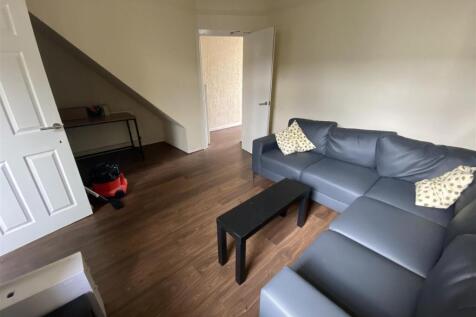 Spacious lounge with a large corner sofa...