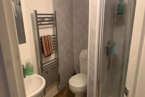 Modern bathroom with sleek heated towel rail....