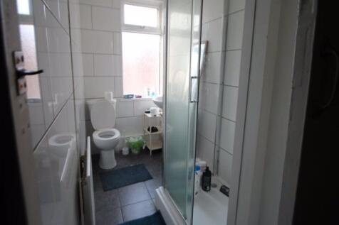 A clean and well-maintained bathroom with a lar...