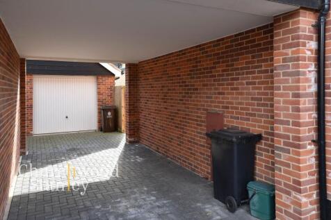 Carport, drive and garage