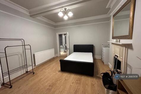 Living Room/Currently Used As a Second Bedroom