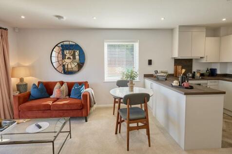 a living room with a couch and a table