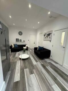 Modern and inviting living room featuring sleek...