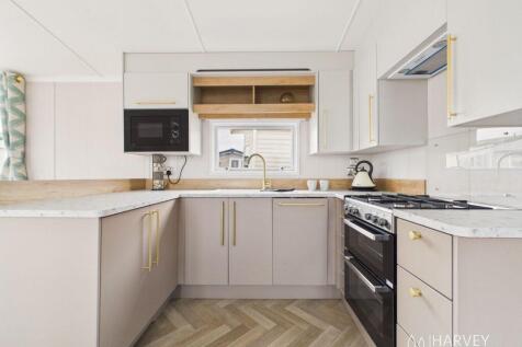 Swift Burgundy modern fitted kitchen at Lossiemout