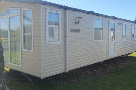 Side Exterior View Of The Swift Bordeaux Holiday C
