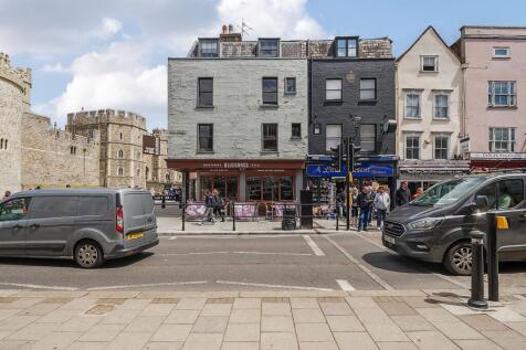Vibrant local high street with shops and cafes...
