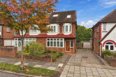 Car-free suburban driveway and home.png