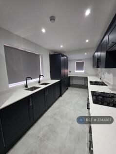 Kitchen With 2 Sets Of Appliances 